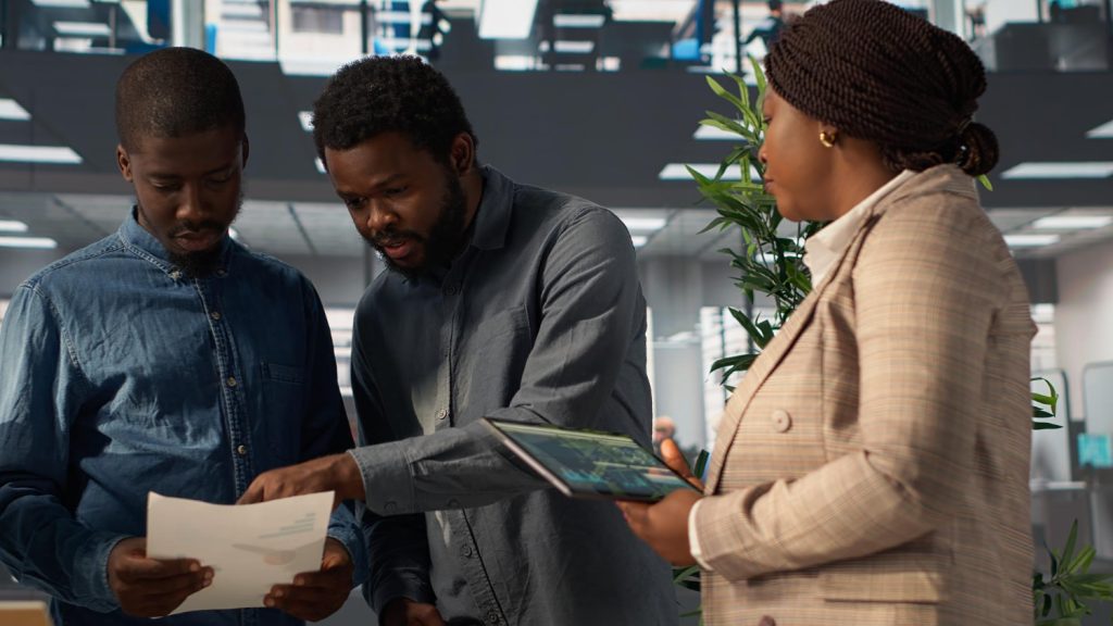 Specialists reviewing a tablet together